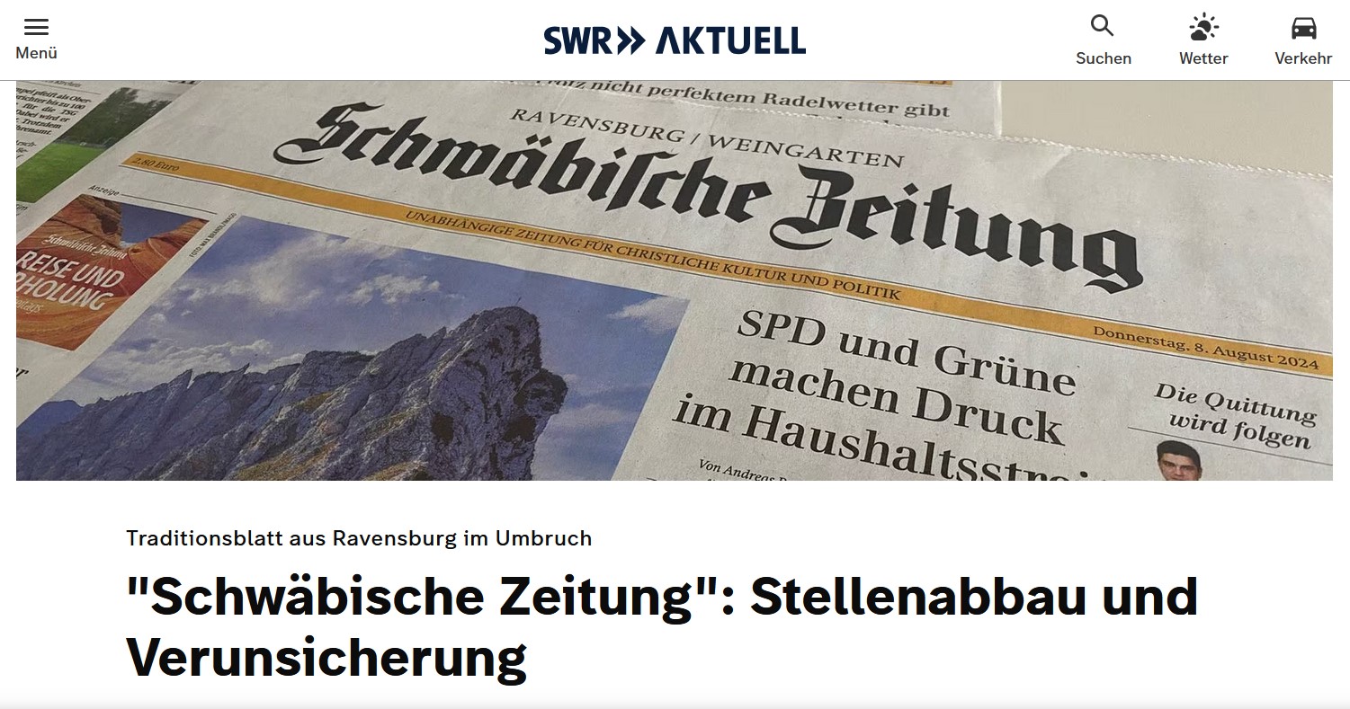 – Gedruckte Ausgaben der Schwäbischen Zeitung in der Berichterstattung über den geplanten Stellenabbau (Bild: SWR)